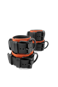 Orange and black leather wrist and ankle restraints set