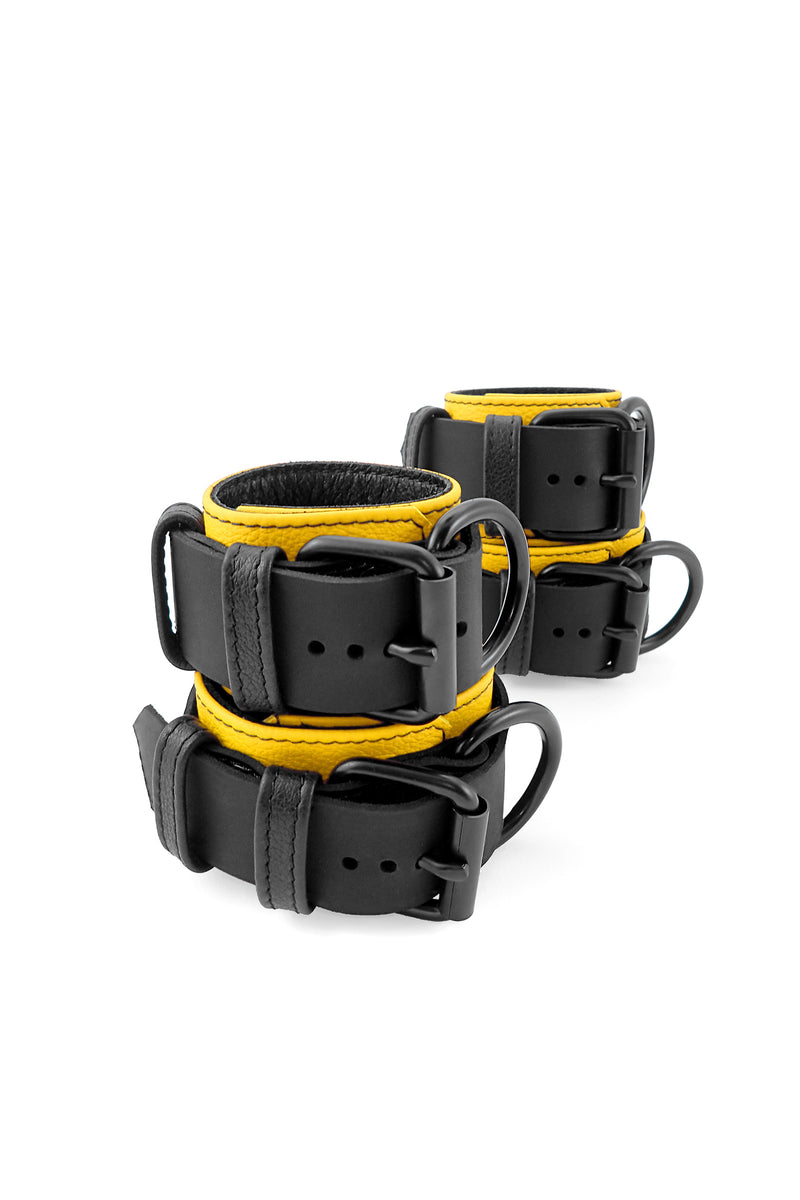 Yellow and black leather wrist and ankle restraints set
