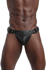 Model wearing black leather thong. Front view.