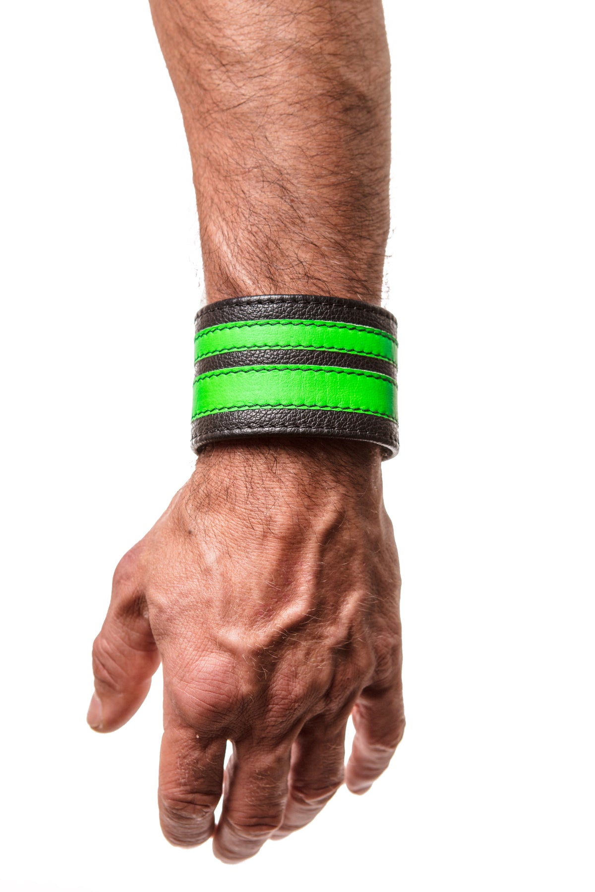 Model wearing a fluro green leather stripe wristband