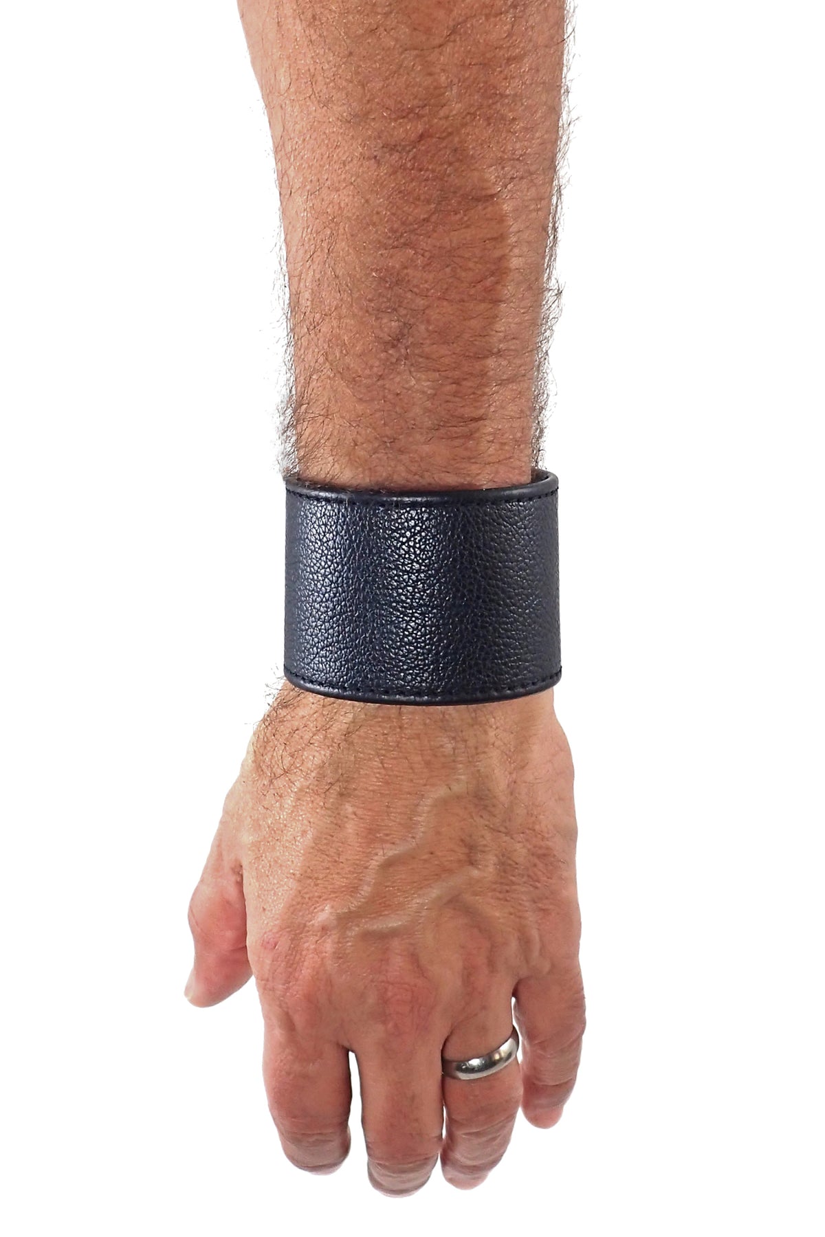 Model wearing a 2" wide black leather wristband