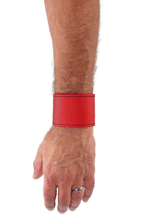 Model wearing a red leather 2" wide leather wristband